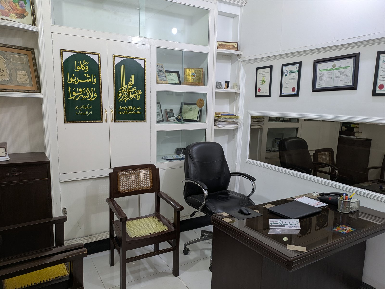 Consultation room with wooden desk